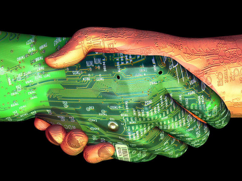 An illustration of circuits shaking hands
